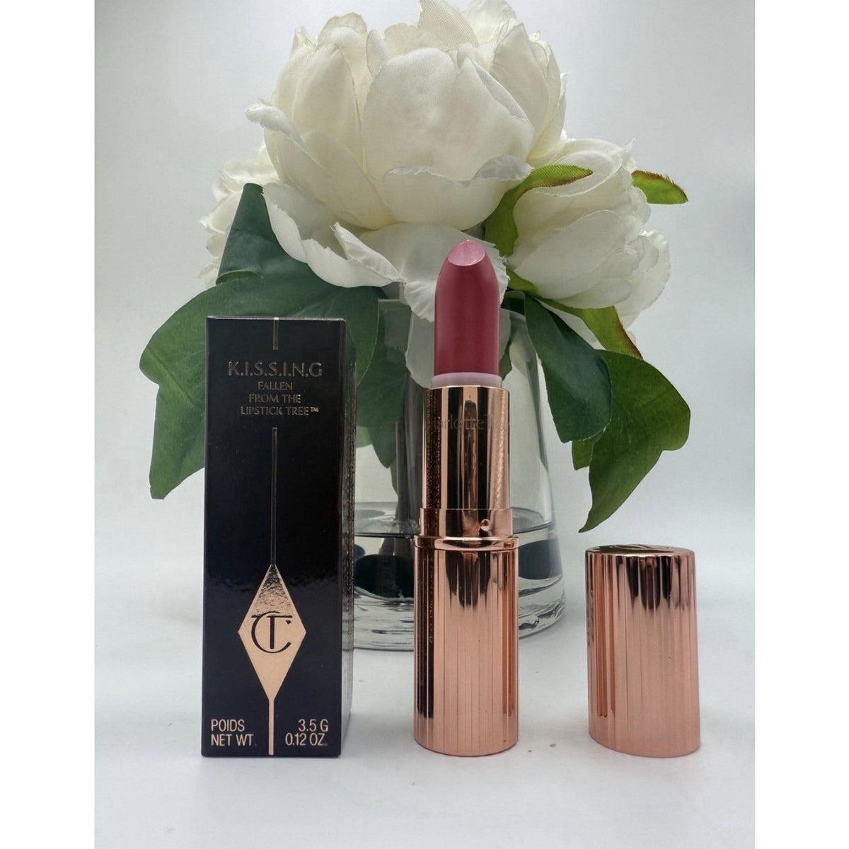 Charlotte Tilbury KISSING Fallen From The Lipstick Tree Coral Kiss 0.12oz